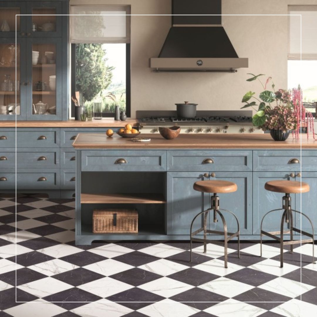 Black and white marble-effect checkerboard floor tiles in a contemporary kitchen