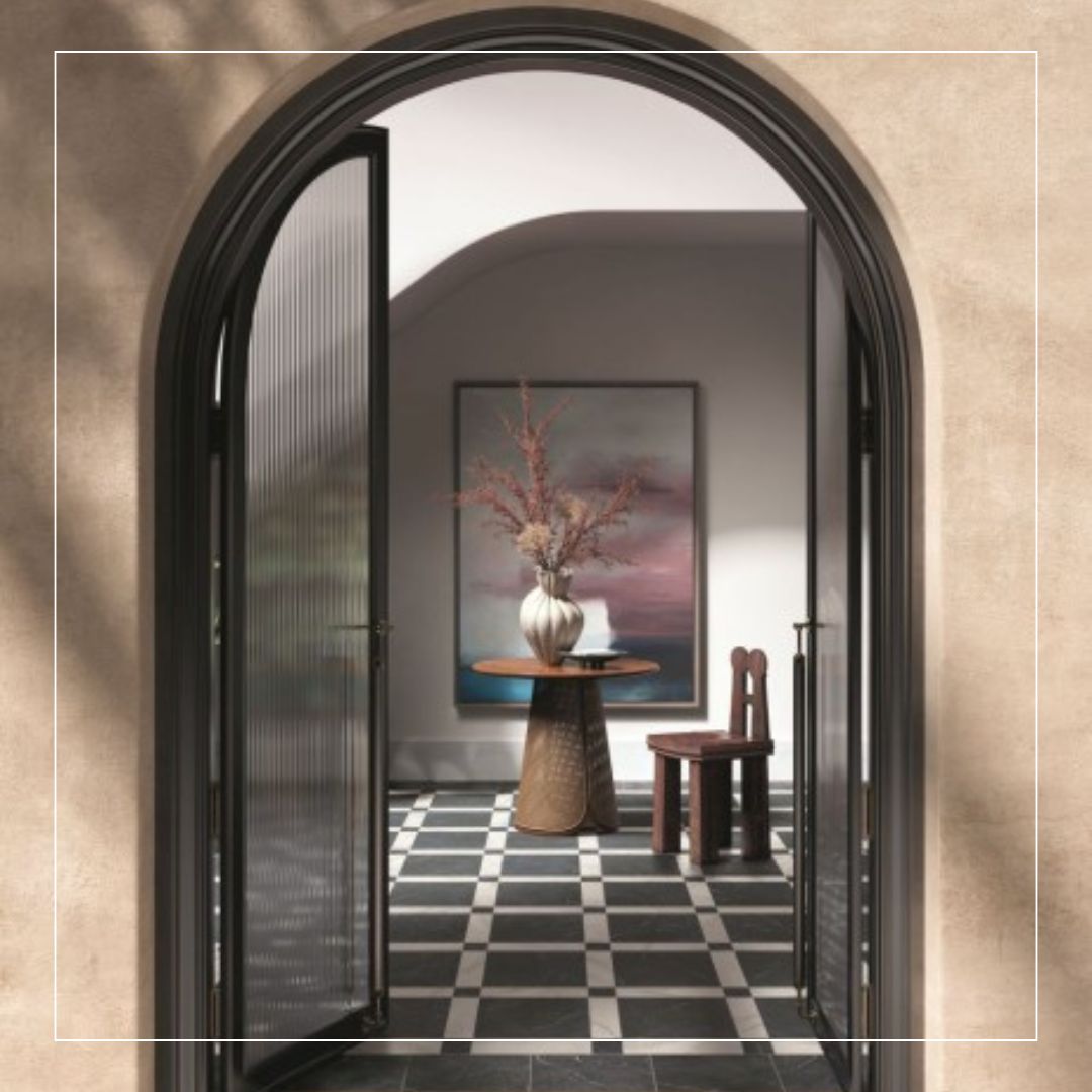 black and white geometric floor tiles arranged in a checkerboard-style pattern