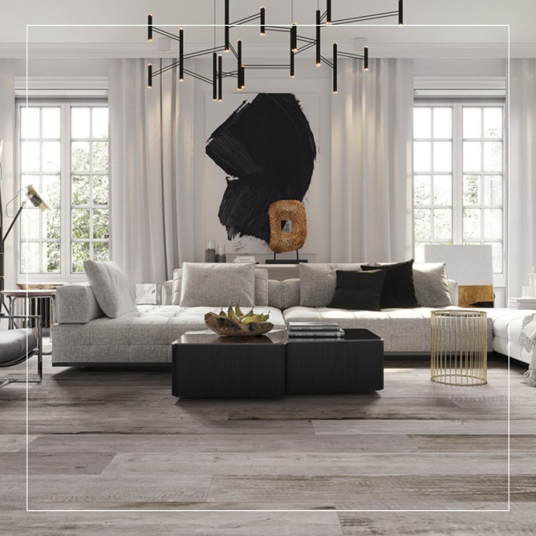Contemporary living room featuring wood-effect porcelain floor tiles in natural grey tones, creating a warm timber look with the durability of porcelain flooring