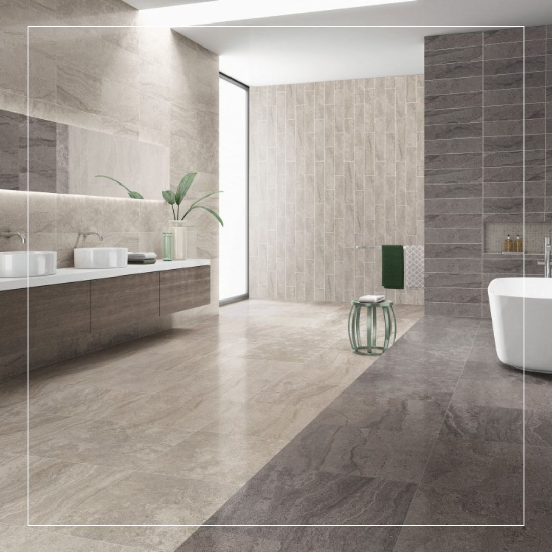 Modern bathroom featuring large-format stone-effect porcelain tiles in beige and grey tones on floors and walls, creating a contemporary spa-style interior.