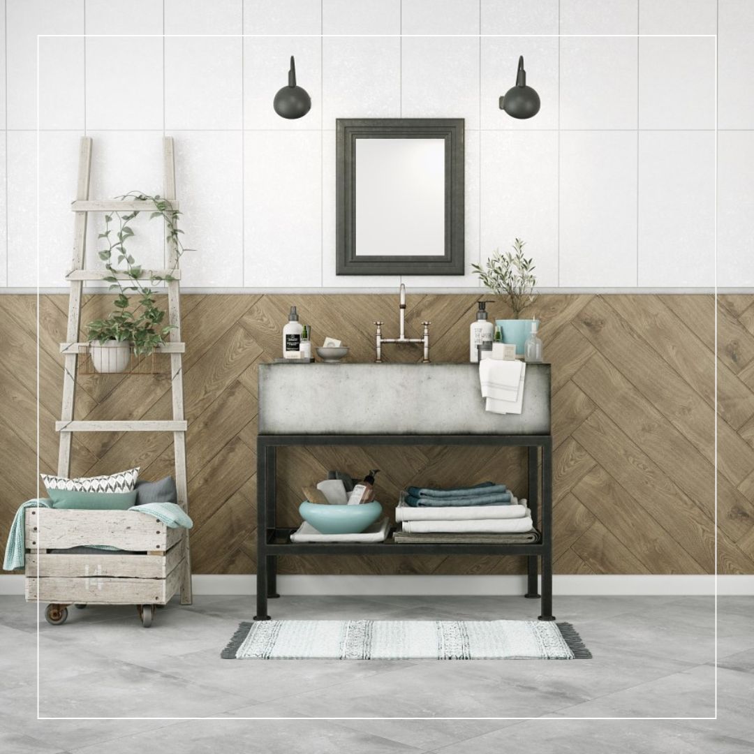 Contemporary bathroom featuring wood-effect porcelain tiles in a herringbone pattern on the walls, paired with large light grey porcelain floor tiles for a modern natural look.