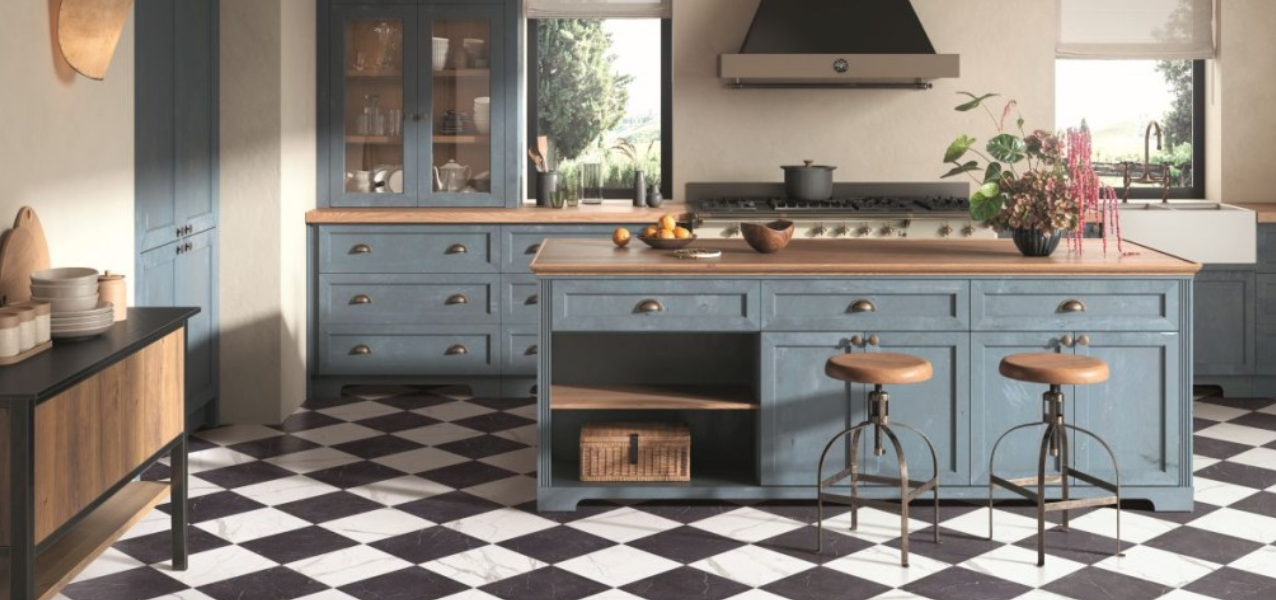 kitchen with black and white marble effect checkerboard floor tiles laid in a diamond pattern