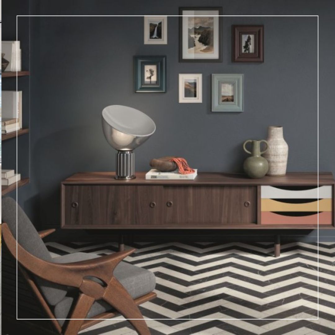 black-and-white chevron porcelain floor tiles in a mid-century modern living room