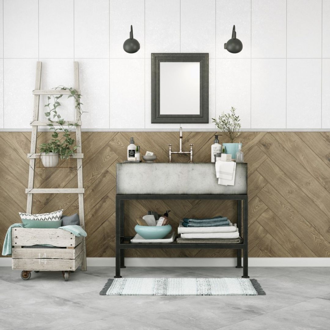 Warm neutral bathroom with white wall tiles, wood-effect herringbone feature wall, industrial vanity unit and black wall lights