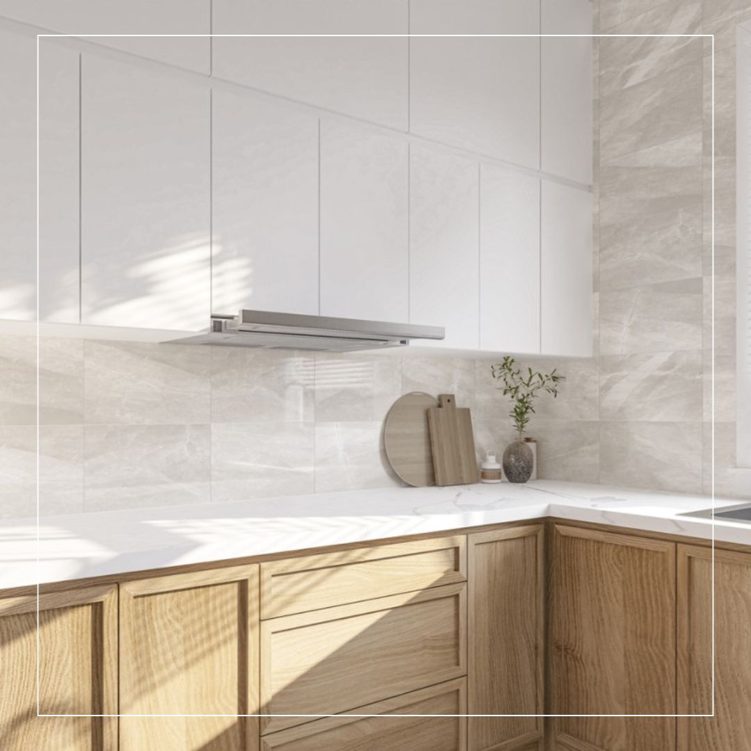 Bright modern kitchen with light wood cabinets, white upper units, and beige stone effect splashback tiles