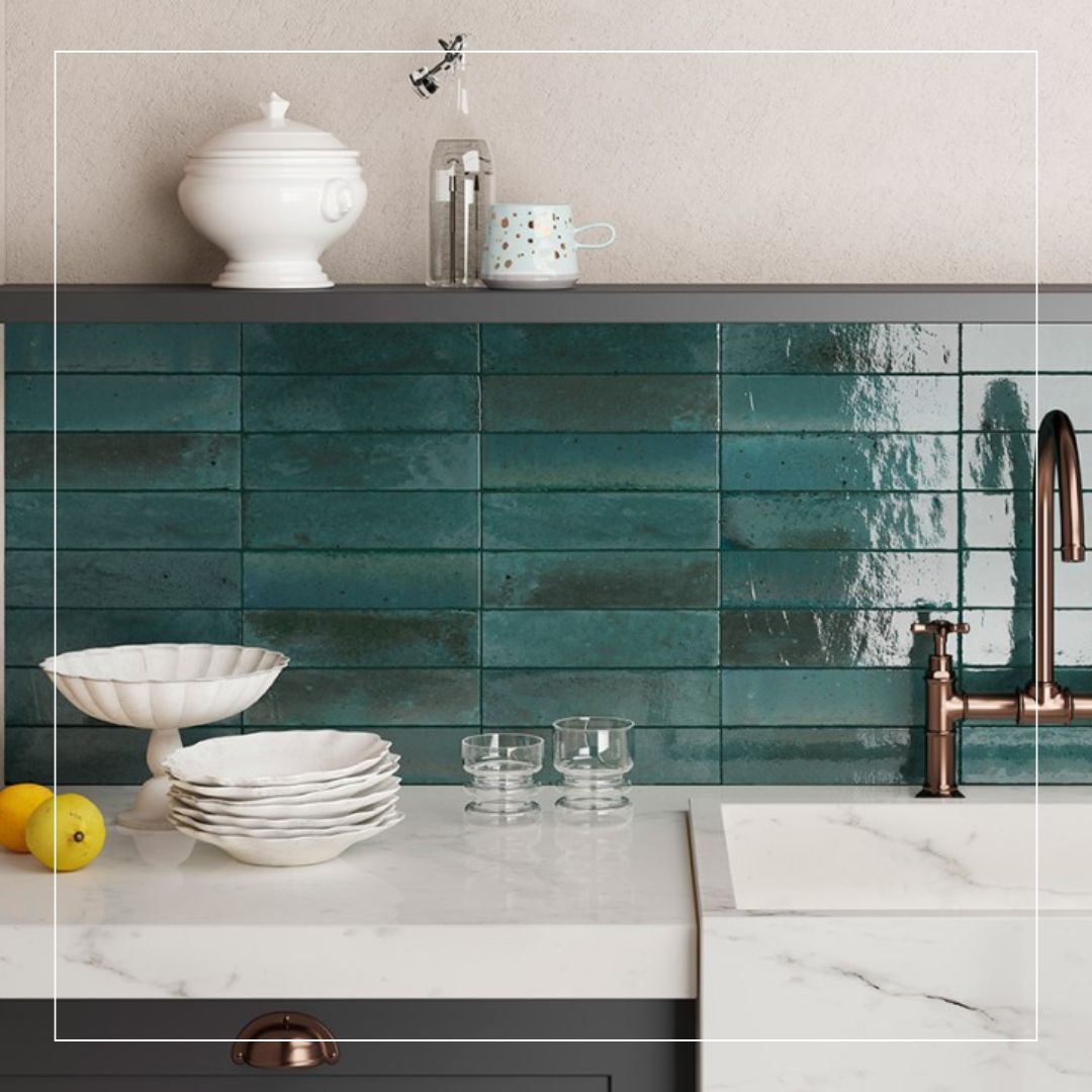 Stylish kitchen with glossy green rectangular splashback tiles