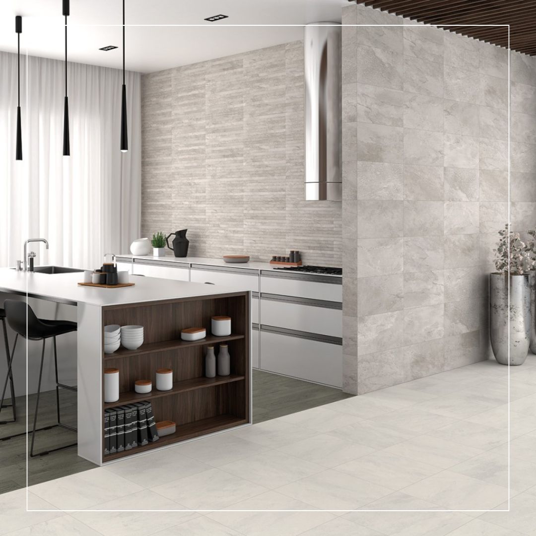 Contemporary kitchen with large grey stone effect splashback tiles, white island with open shelving