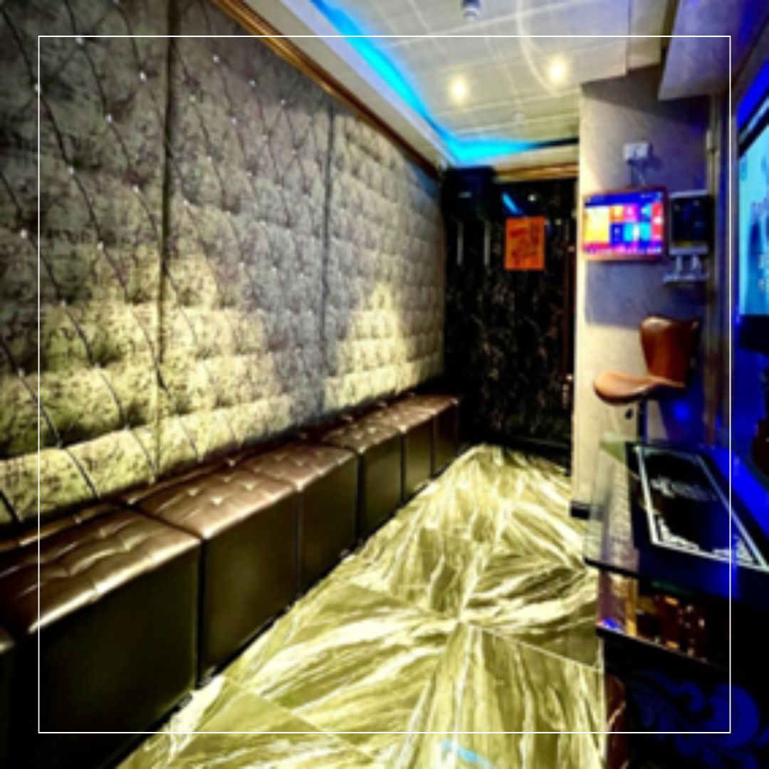 Corridor seating and statement porcelain floor, showcasing durable, low-maintenance tiles for high-traffic venues from a leading tiles supplier for commercial projects